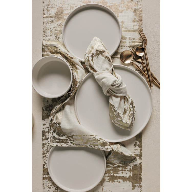 A set of Heirloom Glimmer Table Linens on a table with Ivory Foundation Plates and an Ivory Foundation Bowl.